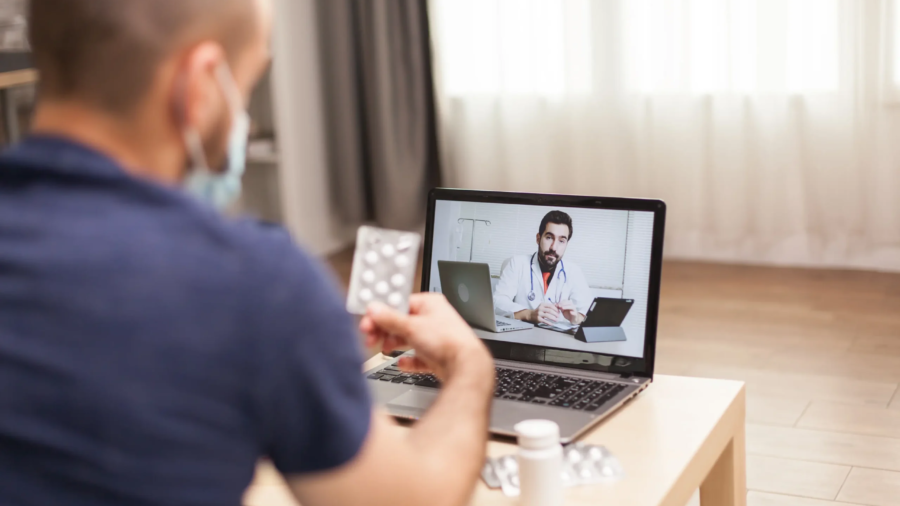 adult-man-talking-with-doctor-about-his-treatment-global-pandemic