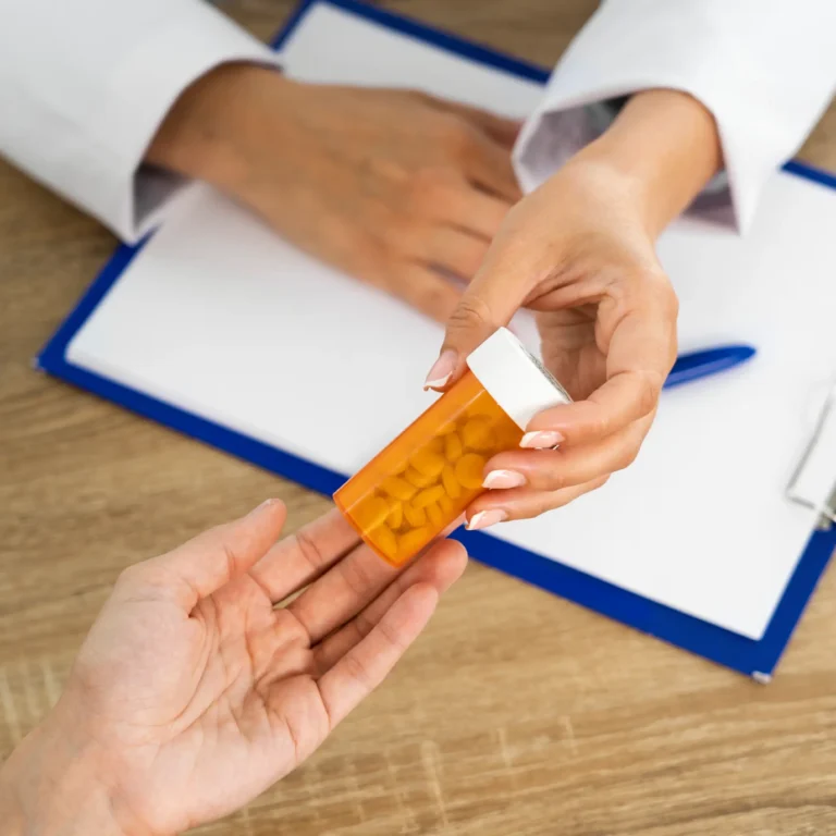 high-angle-people-holding-pills